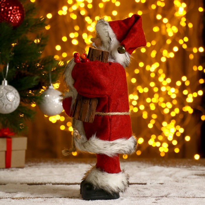 Дед Мороз  В красной шубке, с брёвнышком 29 см 3555414 (Вид 2)